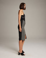 Model wearing Arrow Wrap Pencil Skirt in felted wool, side view