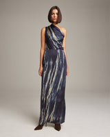 Model wearing a midnight tie dye convertible dress, showcasing its elegant design.