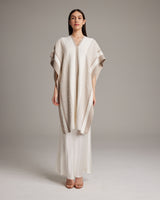 Model wearing Manta Comunidad in Textured Cotton, showcasing its design and texture.