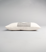 Side view of Diamante Lumbar Pillow in Ivory with diamond pattern