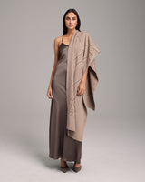 Model wearing Raiz Shawl in Baby Alpaca, showcasing its design and texture