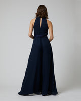 Back view of Matte Chiffon Palazzo Jumpsuit, featuring a keyhole opening and belt.
