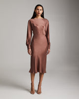 Model wearing Bias Midi Skirt in Cupro Rayon, mauve color