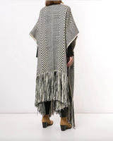 Back view of a black and ivory long chevron duster with fringe