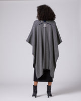 Model wearing a grey Copihue Duster, showing the back view