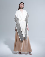 Model wearing an Ivory/Black Striped Edge Caftan, showcasing its design and fit.