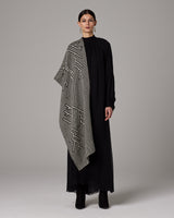 Model wearing Raiz Shawl in Baby Alpaca with geometric design