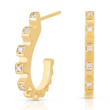 Gold hoop earrings with diamond accents, featuring a curved design.