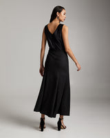 Model wearing a black Linen Spiral Skirt from the back