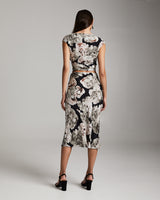 Back view of a model wearing the Bias Midi Skirt in Floral Silk