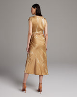 Back view of Tie Dye Bias Midi Skirt in gold, showcasing the drape and fit.