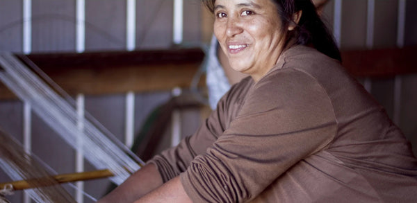 Veronica Currivil Nahuel weaving in a workshop