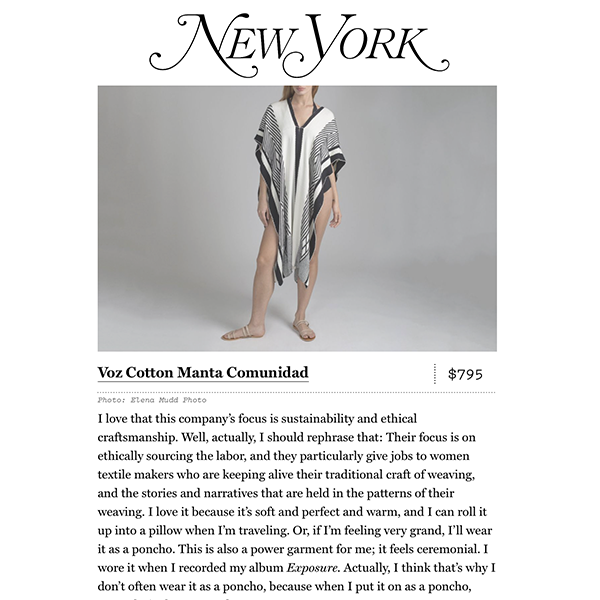 Model wearing a striped cotton manta, highlighting sustainable fashion.
