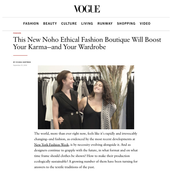 Two women smiling in a fashion boutique, showcasing ethical fashion.
